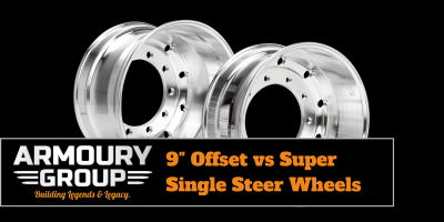 Two polished metal truck wheels are displayed side by side on a black background.